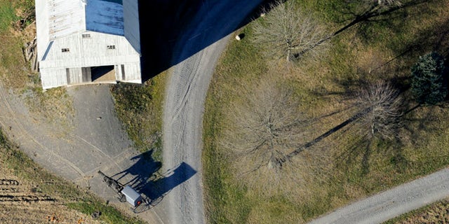 Nov. 20, 2013: An Amish buggy heads down a driveway to a farm off of Greenleaf Road near Washingtonville, Pa.,