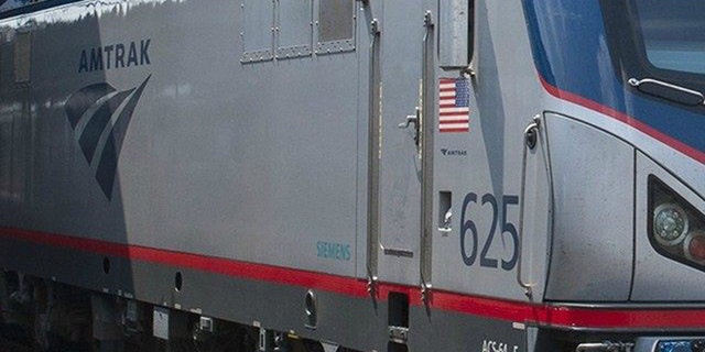 An Amtrak locomotive is shown.