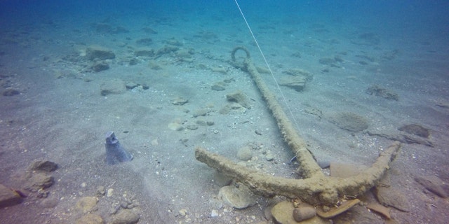 The ship’s anchor as it was discovered in the sea. (The Marine Archaeology Unit of the Israel Antiquities Authority)