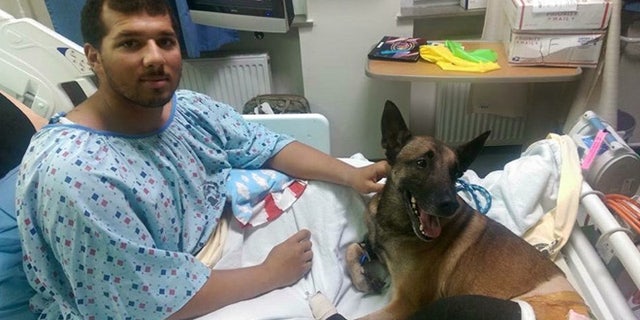 Spc. Andrew Brown and Rocky at the military hospital in Germany are expected to recover from their injuries.
