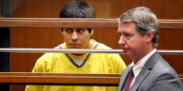 In this Jan. 12, 2015 file pool photo, Andrew Garcia, left, appears during a hearing in Los Angeles County Superior Court in Los Angeles.