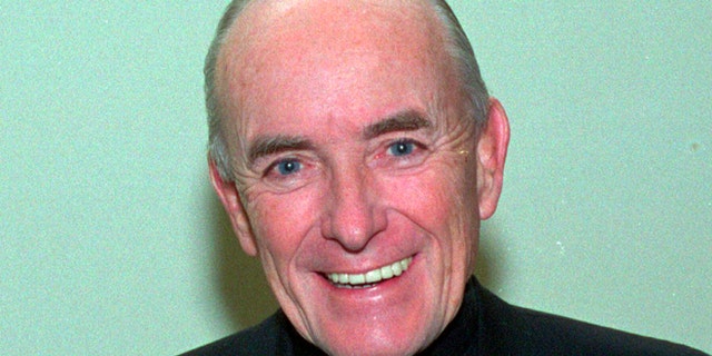This 1992 file photo shows Rev. Andrew Greeley, an outspoken Roman Catholic priest, prolific best-selling novelist and Chicago newspaper columnist whose career spanned five decades. His longtime publicist said that Greeley died Wednesday, May 29, 2013, at his home in Chicago. He was 85.
