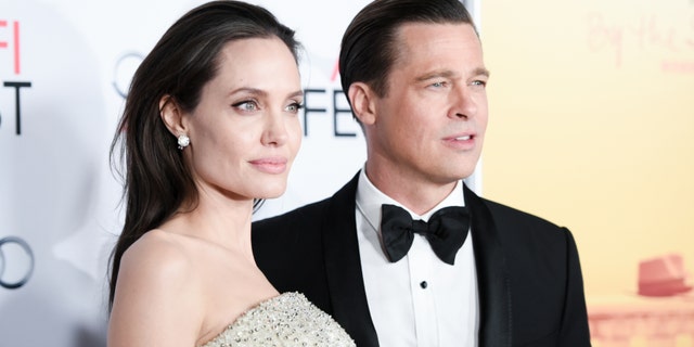 November 5, 2015. Angelina Jolie, left, and Brad Pitt arrive at the 2015 AFI Fest opening night premiere of "By The Sea."