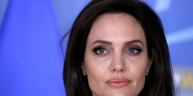 UNHCR Special Envoy actor Angelina Jolie takes part in a news conference at the NATO headquarters in Brussels, Belgium, January 31, 2018. REUTERS/Yves Herman - RC1FB8FE35C0