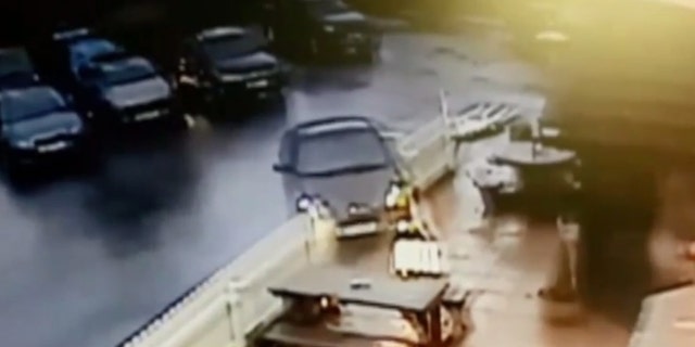 The driver mowed through outdoor tables and seating before pulling out of the parking lot and onto the road.