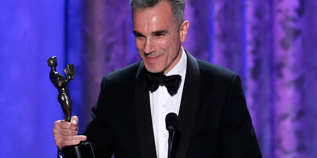 Daniel Day-Lewis accepts the award for outstanding male actor in a leading role for "Lincoln" at the 19th annual Screen Actors Guild Awards in Los Angeles, California January 27, 2013.