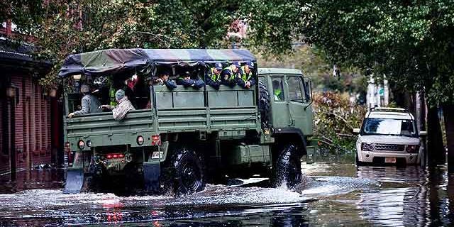 The National Guard arrived in Hoboken, NJ on Wednesday to rescue apartment dwellers who had been trapped since the storm began.