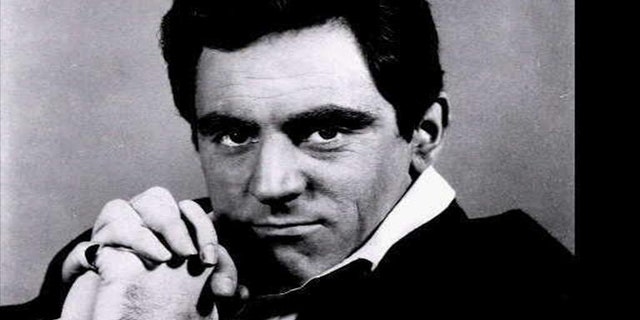 Anthony Newley is seen in a 1965 headshot.