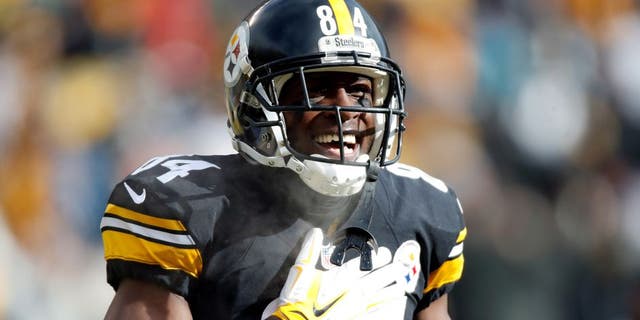 PITTSBURGH, PA - JANUARY 08: Antonio Brown #84 of the Pittsburgh Steelers celebrates after scoring his second touchdown during the first quarter against the Miami Dolphins in the AFC Wild Card game at Heinz Field on January 8, 2017 in Pittsburgh, Pennsylvania. (Photo by Gregory Shamus/Getty Images)