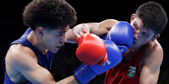 Antonio Vargas, left, during boxing match at the 2016 Summer Olympics in Rio de Janeiro, Brazil, Saturday, Aug. 13, 2016.