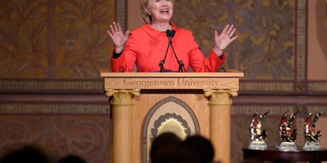 Former Secretary of State Hillary Clinton speaks at Georgetown University in Washington, Friday, March 31, 2017, on the important role that women can play in international politics and peace building efforts. (AP Photo/Susan Walsh)