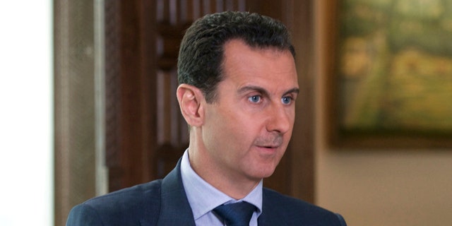 FILE -- In this Sept. 21, 2016 file photo released by the Syrian Presidency, Syrian President Bashar Assad speaks to The Associated Press at the presidential palace in Damascus, Syria. U.S. Secretary of State Rex Tillersons statement Tuesday, April 11, 2017, that the reign of President Bashar Assads family is coming to an end suggests Washington is taking a much more aggressive approach about the Syrian leader. Taking him out of the equation without a clear transition plan would be a major gamble. (Syrian Presidency via AP, File)