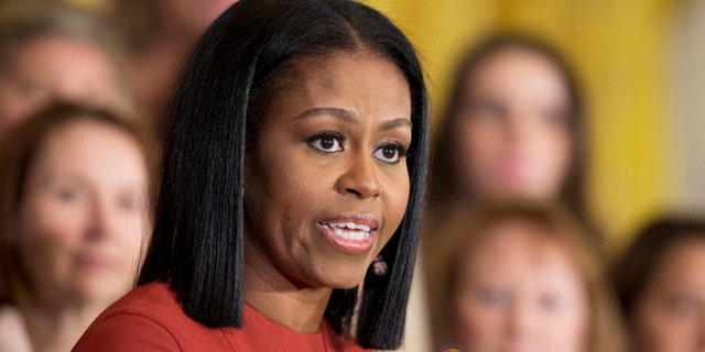 In this Jan. 6, 2017, file photo, then-first lady Michelle Obama speaks at the 2017 School Counselor of the Year ceremony in the East Room of the White House in Washington, D.C.