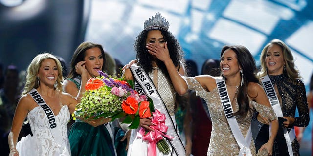 Miss District of Columbia USA Kara McCullough reacts after she was crowned the new Miss USA during the Miss USA contest Sunday, May 14, 2017, in Las Vegas.