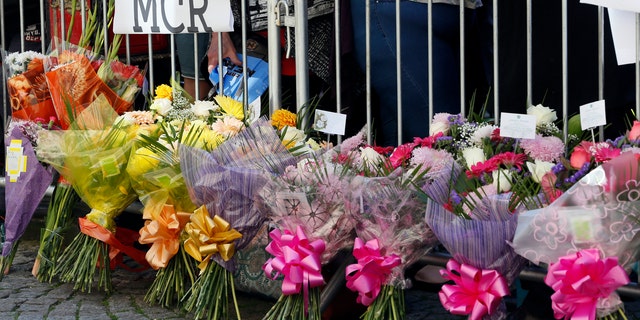 Flowers seen in Manchester after a bombing at an Ariana Grande concert took the lives of 22 people and injured 119 others.