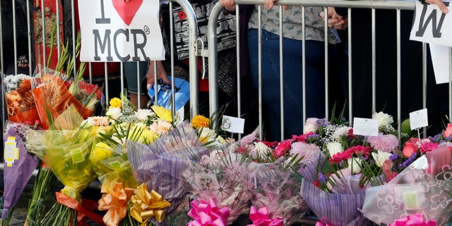 Flowers seen in Manchester after a bombing at an Ariana Grande concert took the lives of 22 people and injured 119 others.