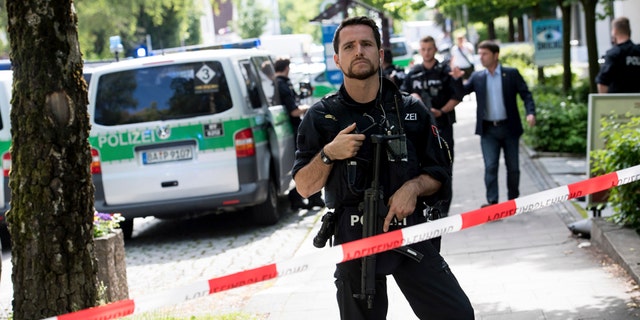 Police block a street near a subway station in Munich, Germany, Tuesday, June 13, 2017.