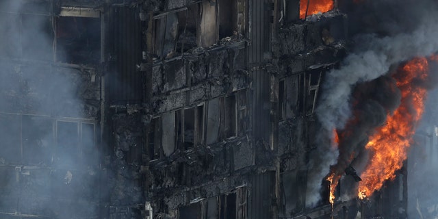Smoke and flames billow from a fire in London.