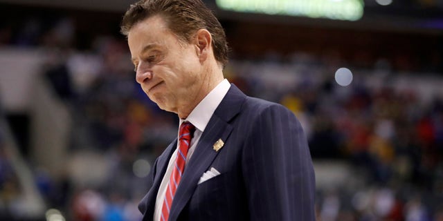 Louisville head coach Rick Pitino walks off the court in the men's NCAA college basketball tournament in Indianapolis on March 19, 2017.