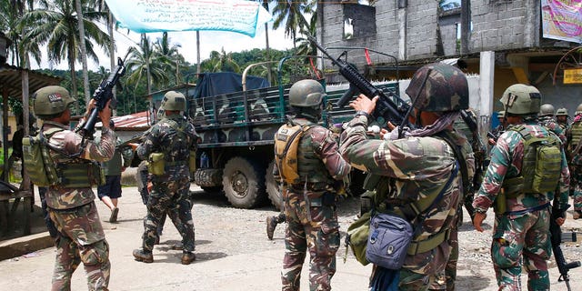 Philippines government troops prepare to head to the frontline as fighting with Muslim militants in Marawi city enters its second week in southern Philippines.