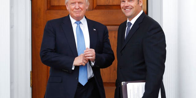 President Trump and Kris Kobach at the president's golf club in New Jersey.