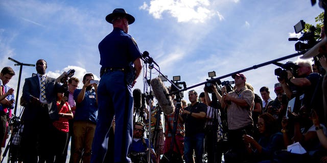 Michigan State Police spokesman Lt. Dave Kaiser speaks to media at Bishop International Airport in Flint, Mich., Wednesday, June 21, 2017, after a police officer was stabbed at the airport.