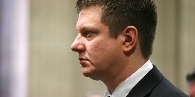 Chicago police officer Jason Van Dyke, who is charged in the 2014 shooting death of black teenager Laquan McDonald, appears at a hearing in his case at the Leighton Criminal Courts Building in Chicago.
