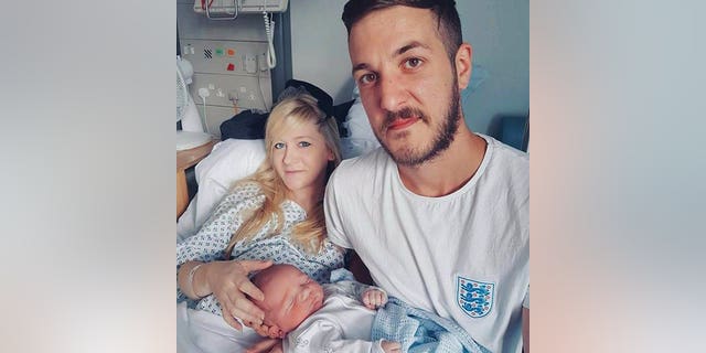 The father of critically ill baby Charlie Gard carries a toy monkey in his pocket as he and Connie Yates, Charlie Gards mother, arrive at the High Court in London, Britain July 14, 2017.