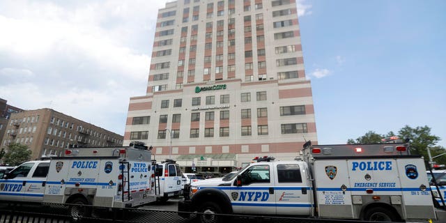 Police vehicles converge on Bronx Lebanon Hospital in New York after a gunman opened fire there on Friday, June 30, 2017. The gunman, identified as Dr. Henry Bello who used to work at the hospital, apparently took his own life after shooting others, authorities said. (AP Photo/Julio Cortez)