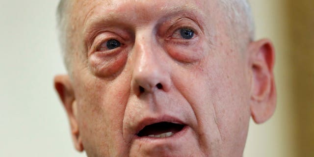 In this June 28, 2017, photo, U.S. Secretary of Defense Jim Mattis speaks in Garmisch-Partenkirchen, Germany. Mattis is giving the military chiefs another six months before they begin allowing transgender individuals to enlist in the armed services. Pentagon spokeswoman Dana White says he made the decision June 30. A Mattis memo obtained by The Associated Press says he wanted to give the services time to insure the change wonât affect the readiness and lethality of the force. (AP Photo/Matthias Schrader)