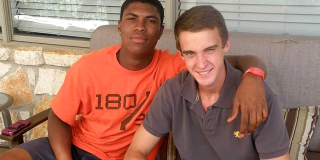 In this 2016 photo provided by John Gramlich shows, Bakari Henderson, left, with friend Travis Jenkins, in Austin, Texas. Henderson, of Austin and recent graduate from the University of Arizona, was beaten to death early Friday, July 7, 2017, at a bar in Lagana on the Greek island of Zakynthos.