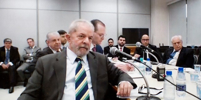 This screen grab of a video recorded on May 10, 2017, released by the Parana Federal Justice department, shows Brazil's former President Luiz Inacio Lula da Silva testifying in the Car Wash investigation in Curitiba, Brazil. A federal judge convicted the ex-president of corruption and money laundering on Wednesday, July 12, 2017 and sentenced him to nine and a half years in jail. Silva will remain free while an appeal is heard. (Parana Federal Justice department via AP)