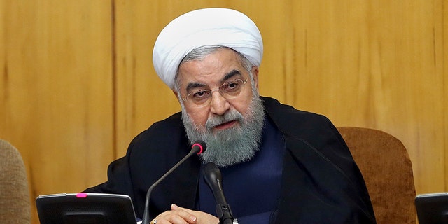 In this photo released by official website of the office of the Iranian Presidency, President Hassan Rouhani speaks during a cabinet meeting in Tehran, Iran, Wednesday, July 19, 2017. Iran's president said Wednesday that his country will stand up to the United States and reciprocate for any new sanctions that America imposes on the Islamic Republic. (Iranian Presidency via AP)