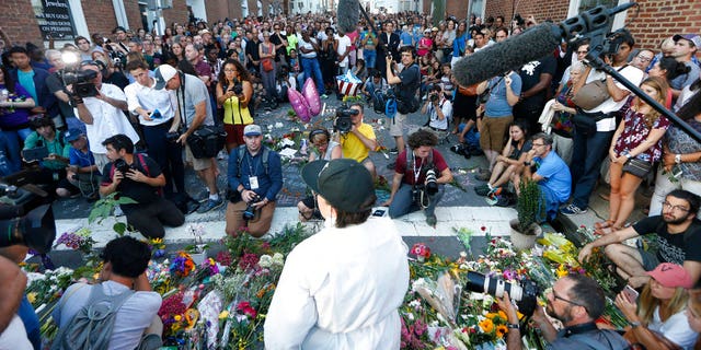 A vigil was held in Charlottesville, Va., one day after a car rammed into a crowd of people, killing one and leaving 19 injured.