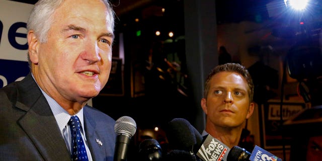 Sen. Luther Strange speaks to media after forcing a runoff against former Chief Justice Roy Moore, Tuesday, Aug. 15, 2017, in Homewood, Ala. (AP Photo/Butch Dill)