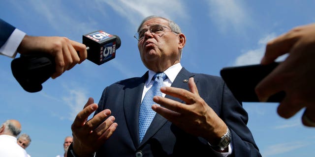 U.S. Sen. Bob Menendez takes questions after a news conference Aug. 17, 2017, in Union Beach, N.J.