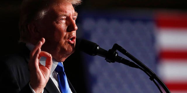 FILE - In this Aug. 21, 2017 file photo, President Donald Trump gestures during a Presidential Address to the Nation about a strategy he believes will best position the U.S. to eventually declare victory in Afghanistan, Fort Myer in Arlington Va. Behind the detail-scarce rhetoric of the new Afghanistan strategy, elements of President Donald Trump's broader approach to foreign conflicts emerge: secret military plans, no "nation-building" and a reliance on regional players to squeeze wayward nations and extremist groups. (AP Photo/Carolyn Kaster, File)