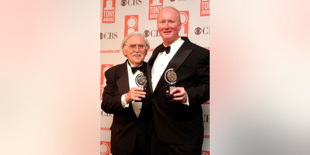 FILE - In this June 8, 2003 file photo, Thomas Meehan, left, and Mark O'Donnell pose with their Tony awards for best book of a Musical for "Hairspray" during the 57th Annual Tony Awards at New York's Radio City Music Hall. On Tuesday, Aug. 22, 2017, Martin Charnin said that Meehan, the three-time Tony Award-winning book writer, has died. Meehan was 88. (AP Photo/Mary Altaffer, File)
