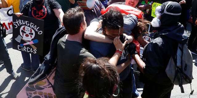 Demonstrators clash during a free speech rally on Aug. 27.