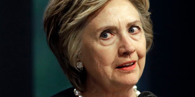 In this June 5, 2017 photo, former Secretary of State Hillary Clinton speaks at a fundraiser for the Elijah Cummings Youth Program in Israel in Baltimore. The FBIââ¬â¢s Hillary Clinton email investigation that ended without charges remains a lingering grievance for President Donald Trump, who holds it up as an example of a ââ¬Åriggedââ¬Â system. (AP Photo/Patrick Semansky)