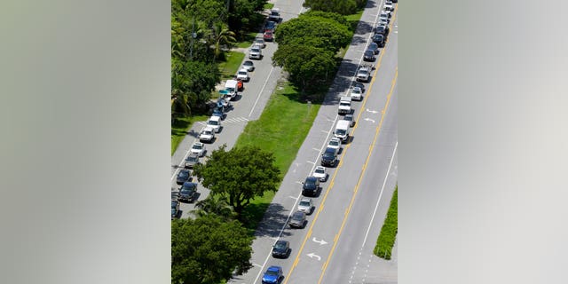 Motorists head north on Highway US 1, in Tavernier, Fla., Sept. 6, 2017