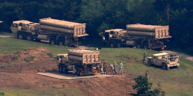 U.S. missile defense system called Terminal High-Altitude Area Defense system, or THAAD, are seen at a golf course in Seongju, South Korea.