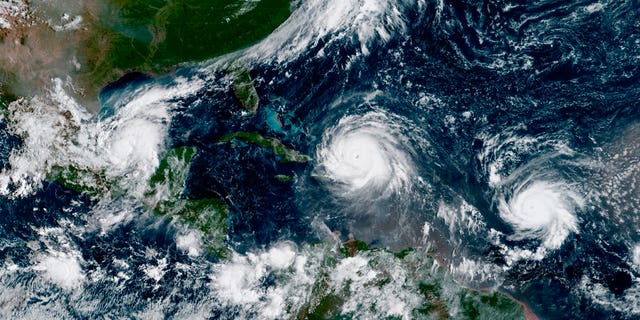 Hurricane Irma, center, with Hurricane Katia in the Gulf of Mexico, left, and Hurricane Jose in the Atlantic Ocean, right.