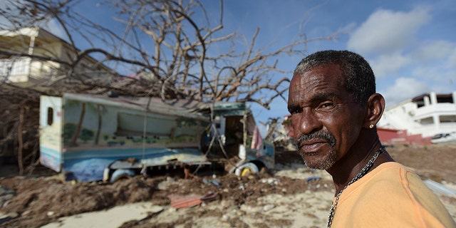 Juan Antonio Higuey shows his destroyed home at Cold Bay community after the passage of Hurricane Irma, in St. Martin.