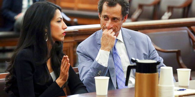 Anthony Weiner, right, and Huma Abedin appear in court in New York on Wednesday, Sept. 13, 2017. The couple asked a New York City judge for privacy in their divorce case. (Jefferson Siegel/The Daily News via AP, Pool)