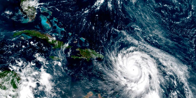 Satellite image taken Tuesday, Sept. 19, 2017, shows Category 5 Hurricane Maria southeast of Puerto Rico.