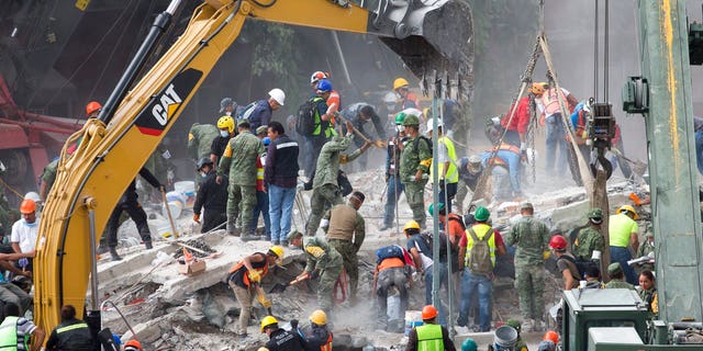 Thousands of workers dug through rubble in an attempt to find survivors after the powerful earthquake struck near Mexico City on Tuesday.