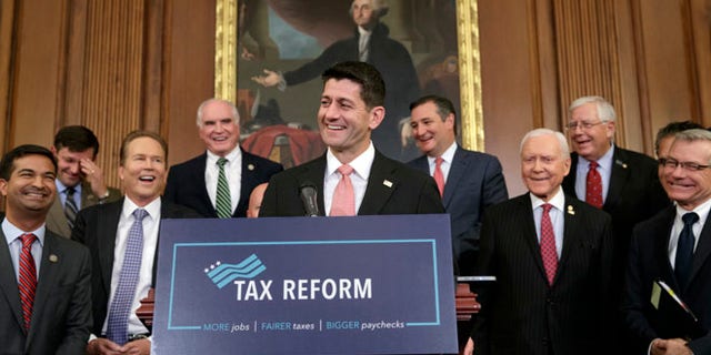 Speaker of the House Paul Ryan, R-Wis., smiles as he talks about the Republicans' proposed rewrite of the tax code for individuals and corporations, at the Capitol in Washington, Wednesday, Sept. 27, 2017. President Donald Trump and congressional Republicans are writing a far-reaching, $5-trillion plan they say would simplify the tax system and nearly double the standard deduction used by most Americans. (AP Photo/J. Scott Applewhite)