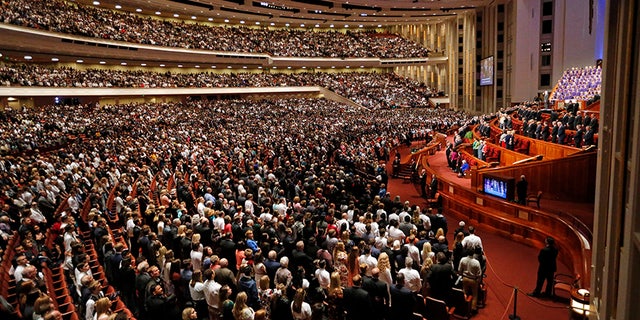 People attend the morning session of the two-day Mormon church conference Saturday, Sept. 30, 2017, in Salt Lake City. (AP Photo/Rick Bowmer)