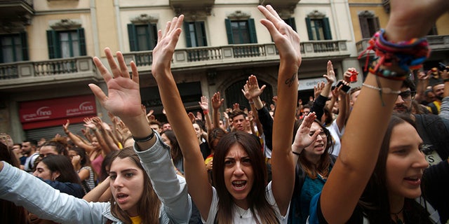 Labor unions and grassroots pro-independence groups are urging workers to hold partial or full-day strikes throughout Catalonia to protest alleged brutality by police during a referendum on the region's secession from Spain that left hundreds of people injured.